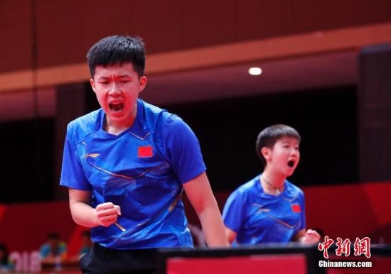 資料圖：雅加達亞運會，王楚欽/孫穎莎奪得混雙冠軍。 <a target='_blank' href='/'>中新社</a>記者 劉關關 攝