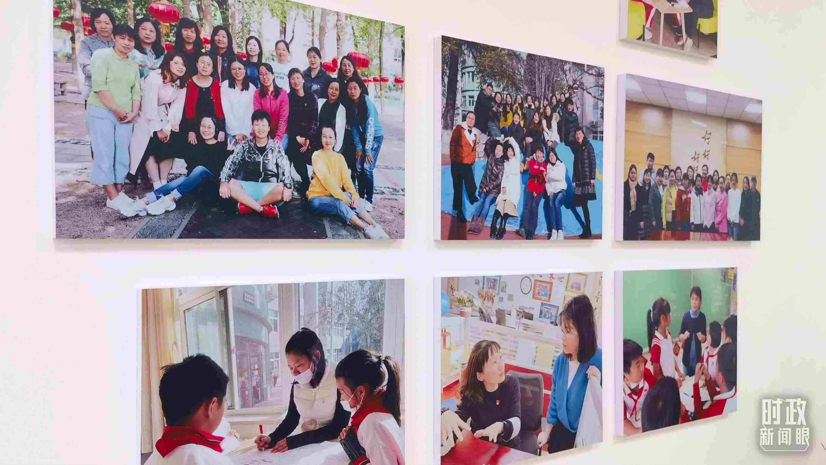 △五年級教師辦公室內(nèi)的合影展板。（總臺央視記者賈林拍攝）