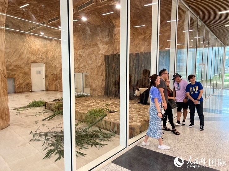 當(dāng)?shù)赜慰团c“四?！焙嫌?。人民網(wǎng)記者 張志文攝