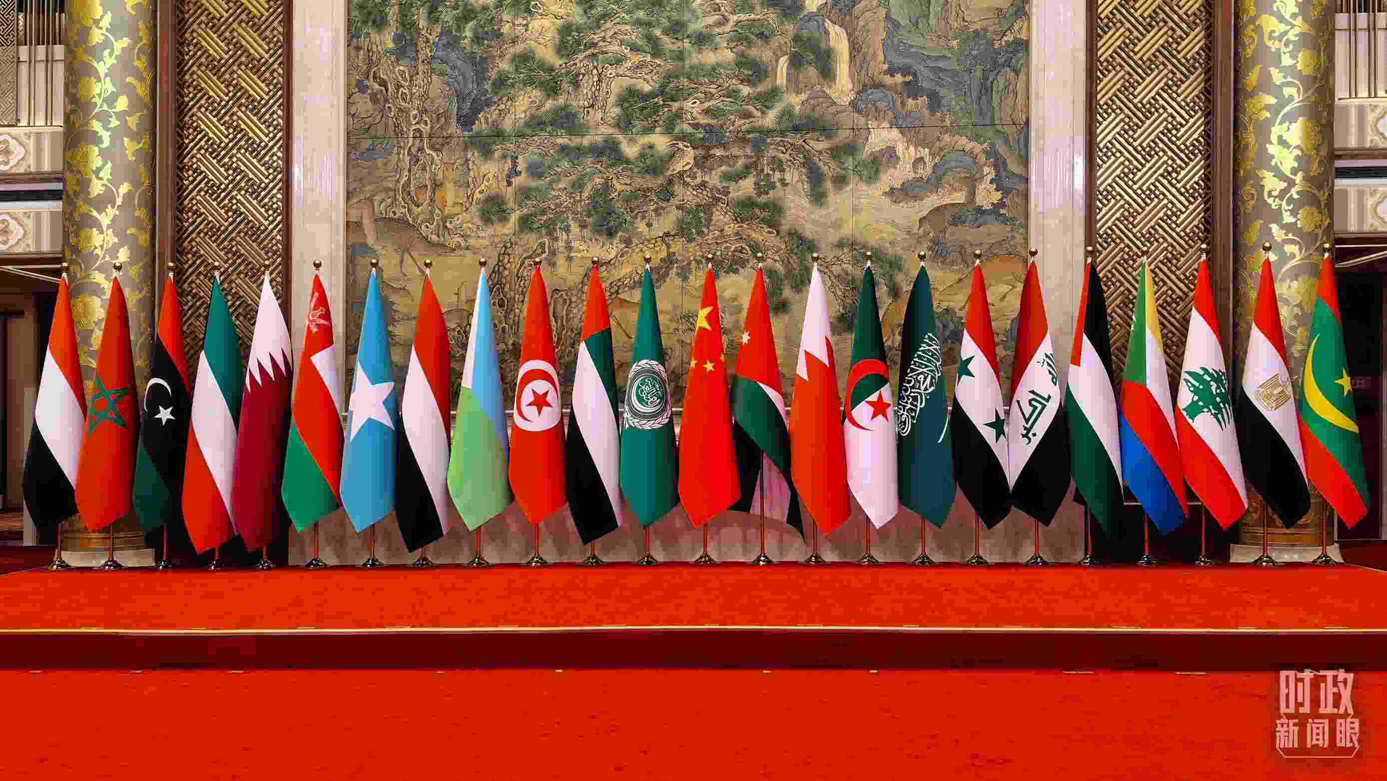 △會議現(xiàn)場的集體合影區(qū)。（總臺央廣記者潘毅拍攝）