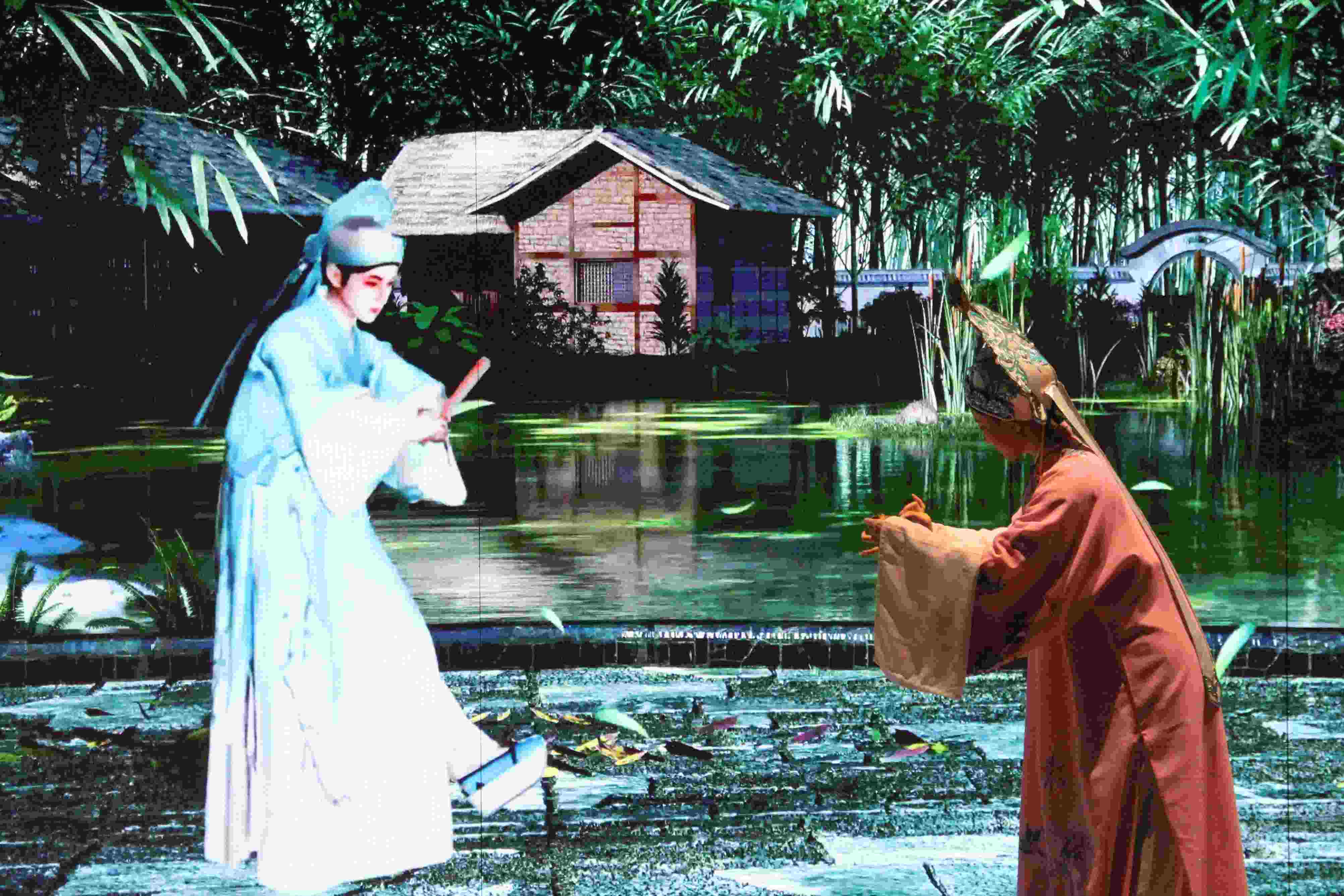 真人演員與虛擬人演員在“元啟金陵”南京數字文化客廳出演《梁山伯與祝英臺》經典選段。受訪者供圖