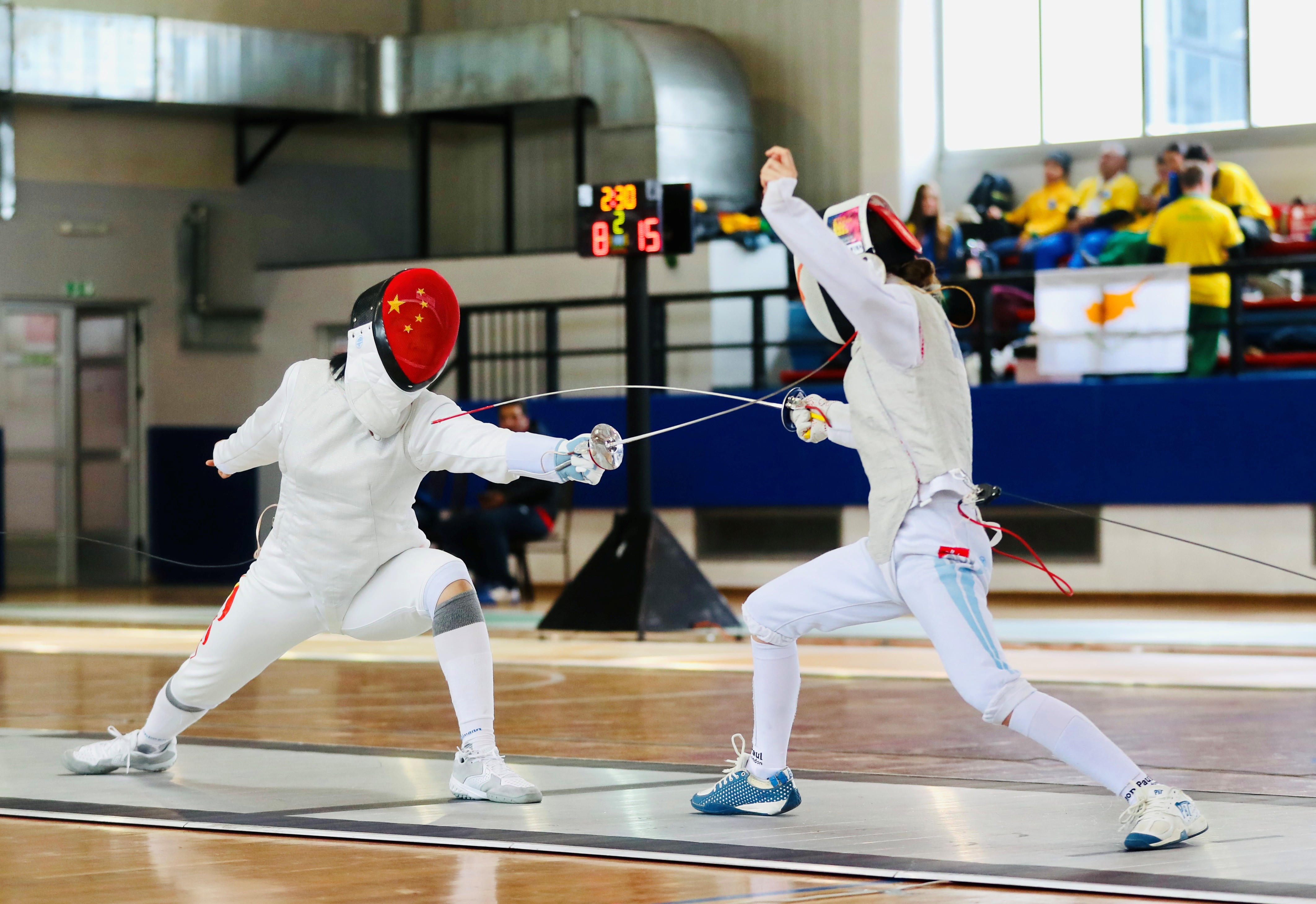 閔文珺（左）在比賽中。圖片來源：中國中學(xué)生體育代表團